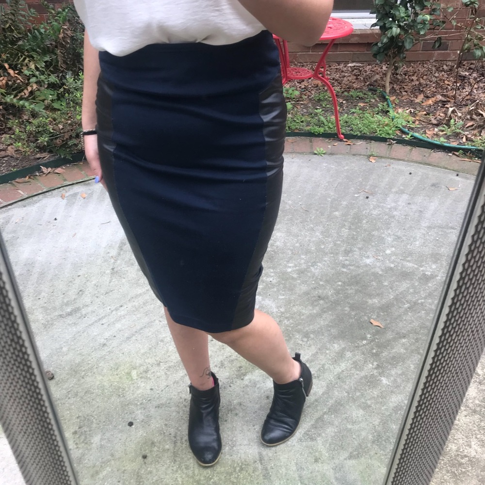 Vegan leather and navy blue stretchy skirt.